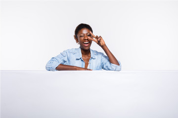 black woman on white empty panel