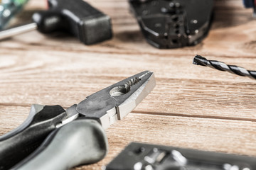 Carpentry tools on wooden surface