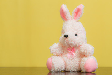 Pink bunny doll Brown background