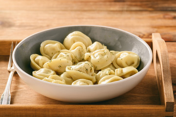 Dumplings stuffed with meat - pelmeni (russian food).