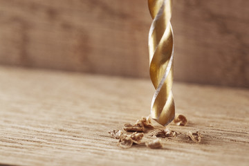 clean drill bit make hole in  oak wooden tabel