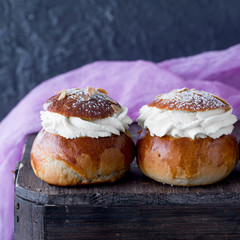 Fresh baked homemade buns on the table for breakfast Baking traditional Swedish semla bread