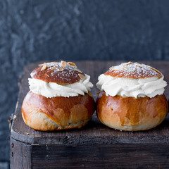 Fresh baked homemade buns on the table for breakfast Baking traditional Swedish semla bread