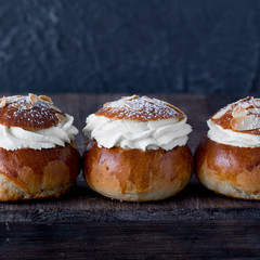 Fresh baked homemade buns on the table for breakfast Baking traditional Swedish semla bread