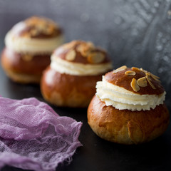 Fresh baked homemade buns on the table for breakfast Baking traditional Swedish semla bread