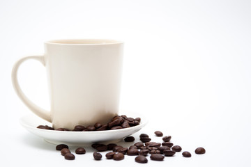 White coffee cup and coffee bean on white background.