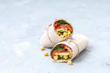 Healthy wraps with salmon and chickpeas for lunch. Love for a healthy food concept