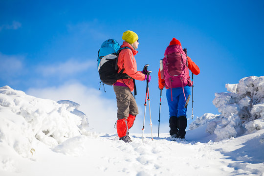 Climbers are on snow.