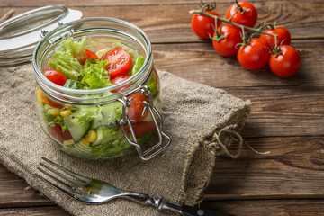Vegetable salad on wooden table