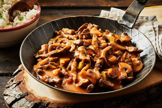 Metal skillet filled with rich beef stroganoff