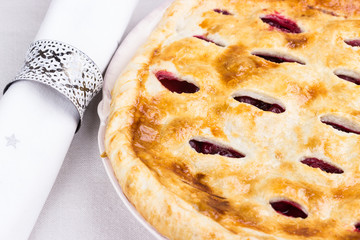 Cherry Pie on linen table cloth