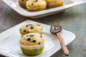 Chocolate chip muffins horizontal and close up image.