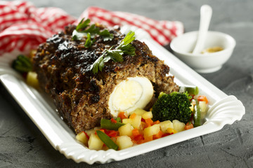 Meat loaf or Falscher Hase, stuffed with hard boiled eggs