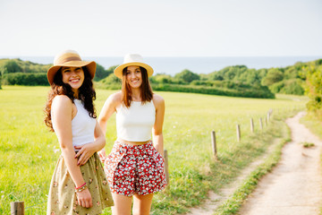 Beautiful friends enjoying summer and nature