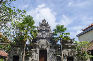 Statues of Hindu God or demons with offerings, Bali, Indonesia