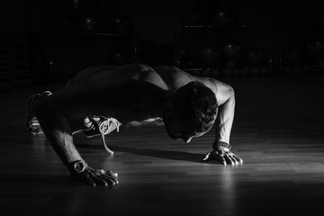 Fitness model exercising sit ups and crunches. Muscular well bui