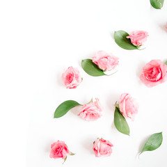 Fototapeta premium Pink roses buds on white background. Flat lay, top view. Valentine's background