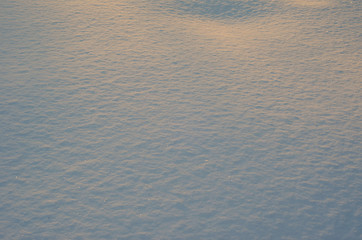Texture of white snow as a background