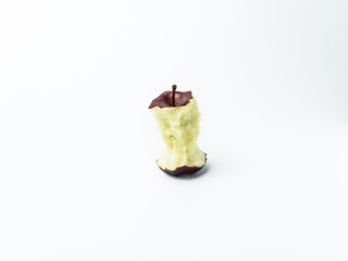 Single red apple with missing a bite isolate on white background