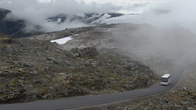 Tour bus climbing up the Dalsnibba pass near Geiranger, Norway