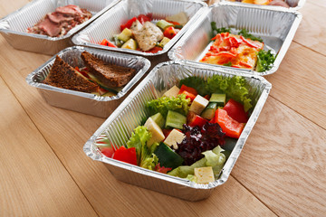 Healthy food in boxes, diet concept.