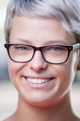 close up portrait of trendy female with glasses