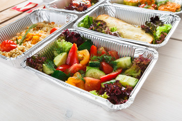 Healthy food in boxes, diet concept.