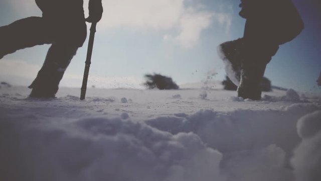 Walking through the deep snow. Vignette color correction
