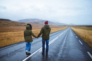 Fototapeta premium Man and Woman Walking Away