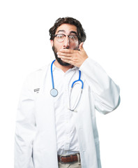 young funny man covering mouth. doctor concept