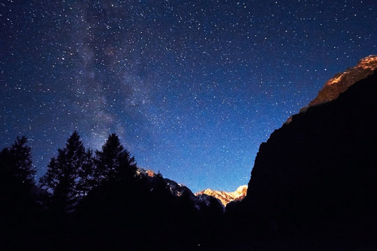 Night sky in the mountains. Milky way. Millions of stars overhead. Journey through the Altai mountains