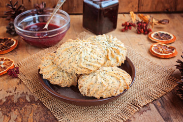 Cookies, poppy; tasty sweet food on a wooden background