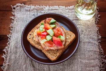 Sandwich with meat of a turkey and vegetables selective focus
