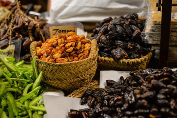 Colorful variety dry fruits and nuts in the street shop vibrant background