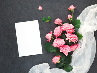 Mockup with bouquet of roses and card