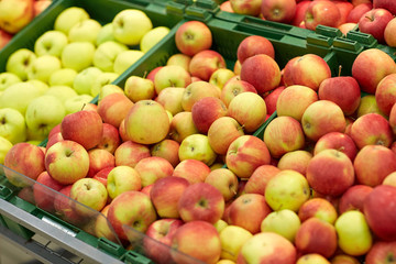 ripe apples at grocery store or market