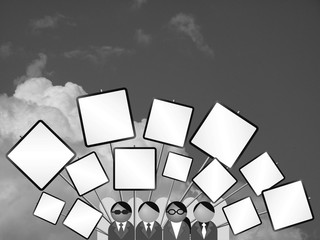 Monochrome crowd protesting with placards blank for own text 