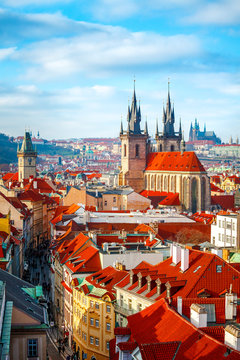 Fototapeta High spires towers of Tyn church in Prague city