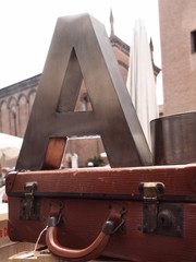 Letter A and suitcase