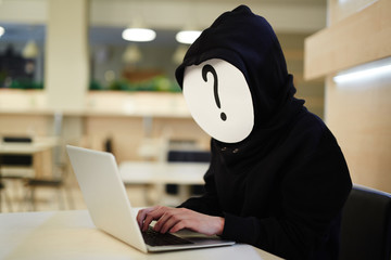 Anonymous hacker at work - Powered by Adobe