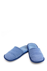 blue textile home slippers isolated on white background