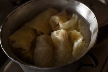 the chef prepares delicious cabbage rolls with meat and