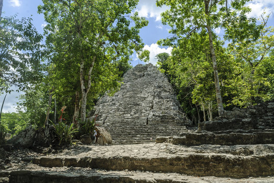 sight of a pyramid in ruins in the Mayan archaeological place of Coba, in Qintana Roo, Mexico