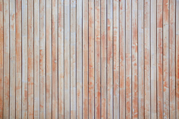 Red wooden background. Textured rustic planks vertically disposed.