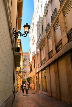  Narrow street  in the historical center of city of Valencia