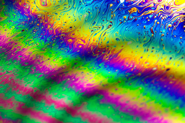 Abstract colorful image of soap bubble surface on closeup