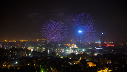 Fototapeta premium Firework on Hanoi liberation 60th day at Hoan Kiem lake, Hanoi, Vietnam