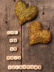 Wooden dices with heart shape