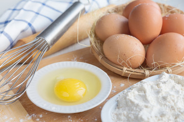 Eggs and flour ingredients like baking, culinary background
