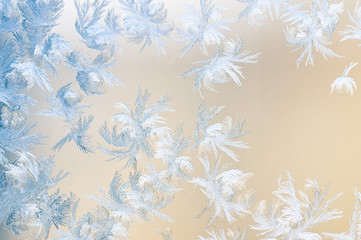 Frosty patterns on glass. Winter background.